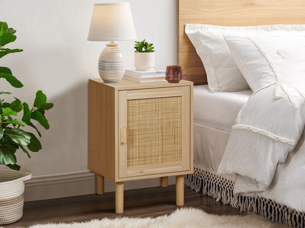 Gila Rattan Bedside Table with pine wood legs and rattan door, styled in a bedroom setting for modern natural decor.